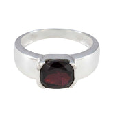 Saanvi luxurious red solitaire ring with cushion cut red gemstone set in polished sterling silver band